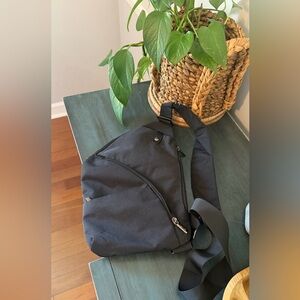 OSOCE anti-theft waterproof crossbody sling bag for travel and daily use.